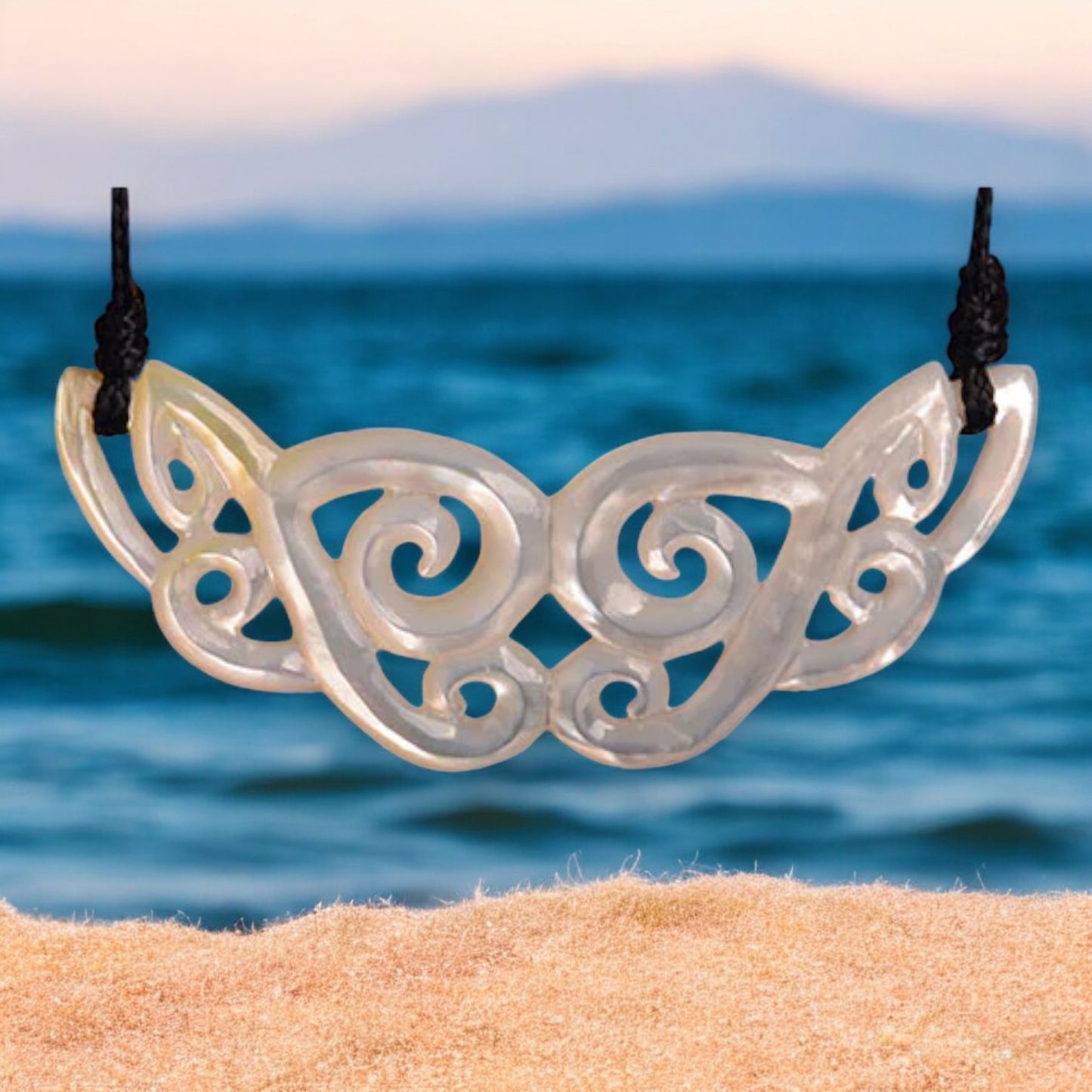 Mother_of_Pearl_Carved_Koru_Pendant - XMT Creations